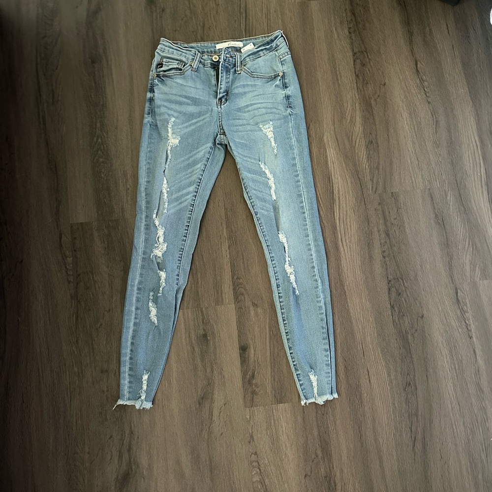 Light blue wash skinny jeans.